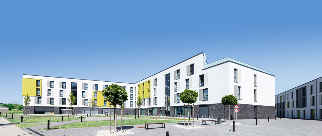 0-IHT Planungsgesellschaft mbH Referenz: Neubau einer Studierendenwohnanlage + Gewerbeeinrichtung für soziale Zwecke